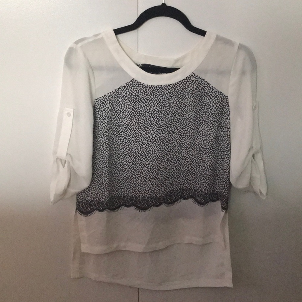 BCBG white blouse with black lace print detail